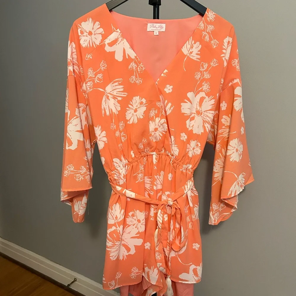 Pink Lily Coral-Peach Floral Romper - Picture 1 of 3